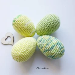 4 umhäkelte Ostereier zur Tischdeko - Gastgeschenk,Ostern,Muttertag,Dekoeier,festlich,modern,easter,sammeln,gelb,grün