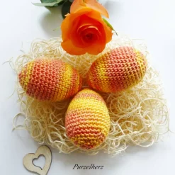 3 umhäkelte Ostereier zur Tischdeko - Gastgeschenk,Ostern,Muttertag,Dekoeier,festlich,modern,gelb,pfirsich