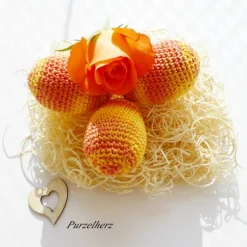 3 umhäkelte Ostereier zur Tischdeko - Gastgeschenk,Ostern,Muttertag,Dekoeier,festlich,modern,gelb,pfirsich