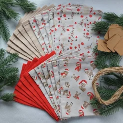 Adventskalender aus Stoff - mit Stoffsäckchen zum selbst befüllen in rot - creme mit süßen Reh, Teddy Weihnachsmuster