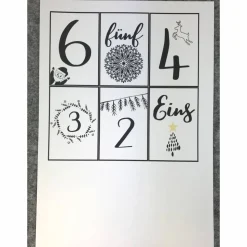 Adventskalender DIY mit Blockbeutel, Zahlen und Holzklammern mir grafischen Motiven