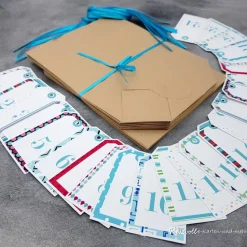 Adventskalender zum Befüllen – 24 Kraftpapiertüten mit Zahlenanhängern & Satinbändern