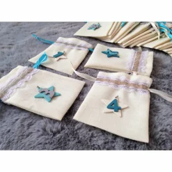 Adventskalendersäckchen türkis weiß zum befüllen nachhaltig wiederverwendbar