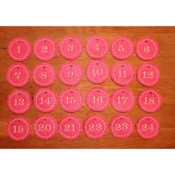 Adventskalenderzahlen rosa Filz rund bestickt