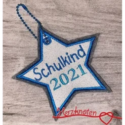 Anhänger, Schulkind, Einschulung, Stern, Filz mit türkis und Glitzer, individuell bestickt