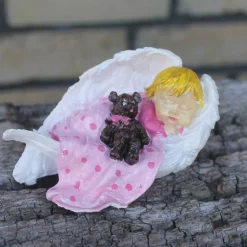 Baby Mädchen mit Teddy in Engelsflügel gebettet, handbemalt