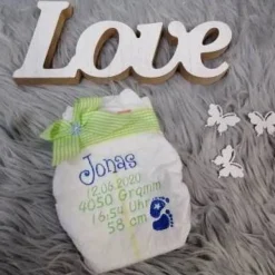 Bestickte Windel mit Spruch: Die goldene Windel für die beste Hebamme