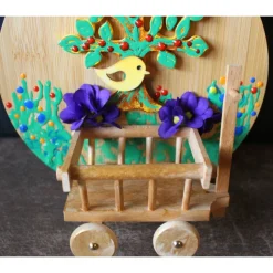 Collage Geldgeschenk zum Muttertag  BAUM & LEITERWAGERL, abstrakt gestaltet auf einem Bambus-Brettchen Wandbild