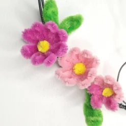 Dekokranz aus Draht mit Hase, Blüten und Schmetterling