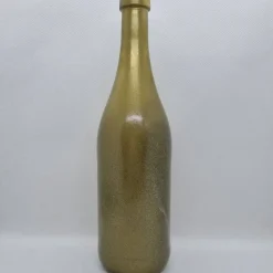 Dekorative Flasche in Kupfer mit Glitzereffekt. Perfekte Tischdekoration für die nächste Feier.