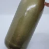 Dekorative Flasche in Kupfer mit Glitzereffekt. Perfekte Tischdekoration für die nächste Feier.