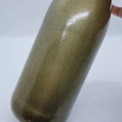 Dekorative Flasche in Kupfer mit Glitzereffekt. Perfekte Tischdekoration für die nächste Feier.