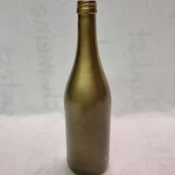 Dekorative Flasche in Kupfer mit Glitzereffekt. Perfekte Tischdekoration für die nächste Feier.