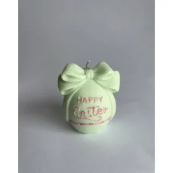 Dekorative Happy Easter Kerze mit Schleife, handgegossen in Frühlingsfarben für deine Osterdeko