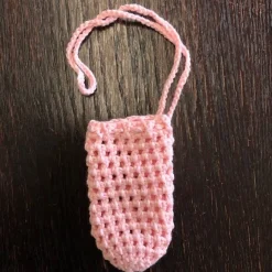 Eine Eierschleuder / Eiernetz / Ostereierschleuder / Ostereiernetz rosa