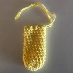 Eine Eierschleuder / Eiernetz / Ostereierschleuder / Ostereiernetz tgelb