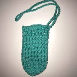 Eine Eierschleuder / Eiernetz / Ostereierschleuder / Ostereiernetz türkis