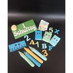 Einschulungsdekoration aus Fondant, Tortendekoration Einschulung, Schulanfang
