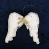 Engelsflügel mit goldfarbener Schleife,  bedruckt mit goldfarben Sternen