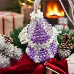 Entdecken Sie 7 cm große Weihnachtswichtel mit befüllbarem Anhänger in violett für einzigartige Geschenke