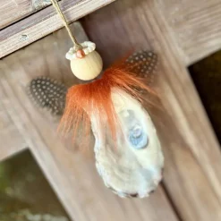 Entzückender Schutzengel aus einer echten Austernschale