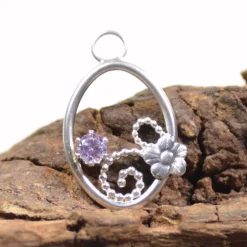 Filigran-Anhänger aus 925 Sterling Silber mit lavendelfarbenem Zirkonia und Blüte - handgemacht