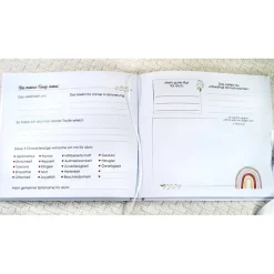 florales Gästebuch & Album zur Taufe mit Blume & Schmetterling in Hellgrün / Pfirsich blanko o. mit Fragen / Fragebogen