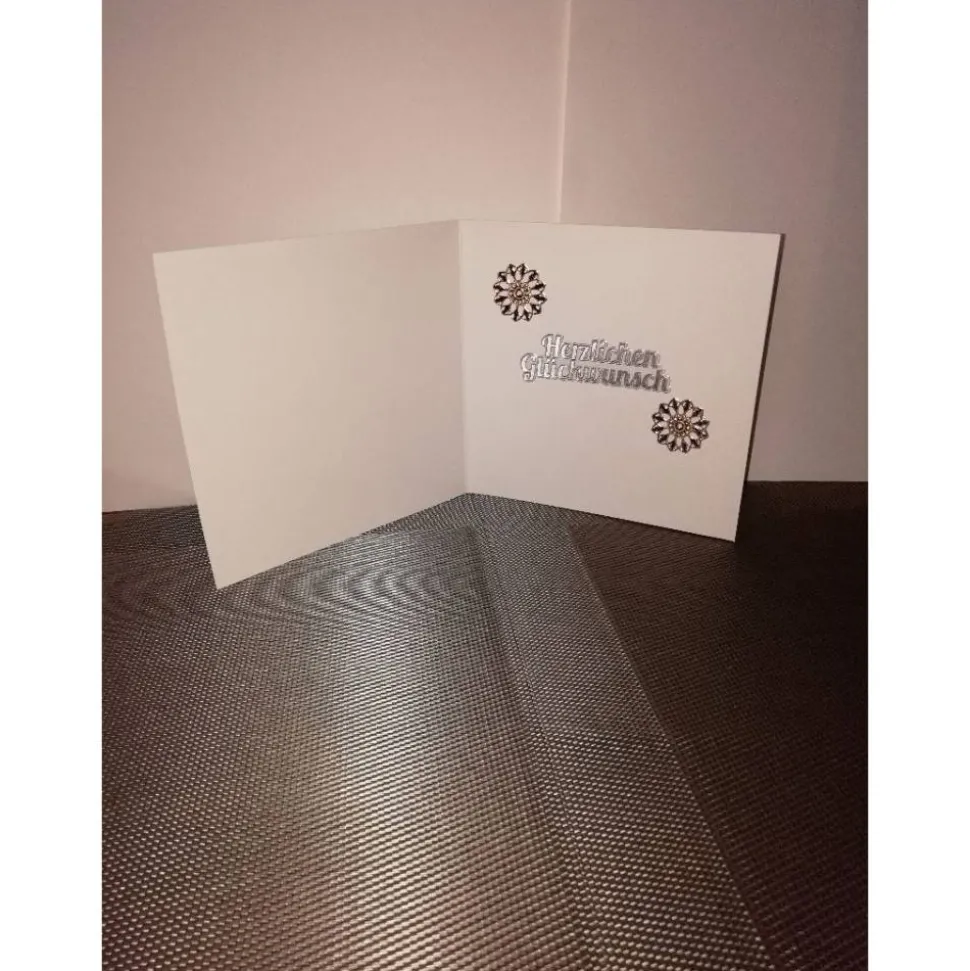 Geburtstagskarte für eine Frau in türkis, silber mit einem blauen Schmetterling