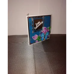 Geburtstagskarte für eine Frau in türkis, silber mit einem blauen Schmetterling