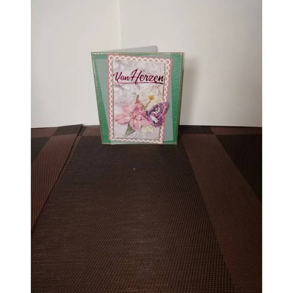 Geburtstagskarte für eine Frau mit rosafarbenen Blumen