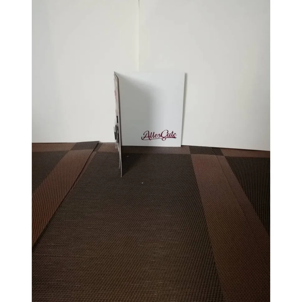 Geburtstagskarte für eine Frau mit rosafarbenen Blumen