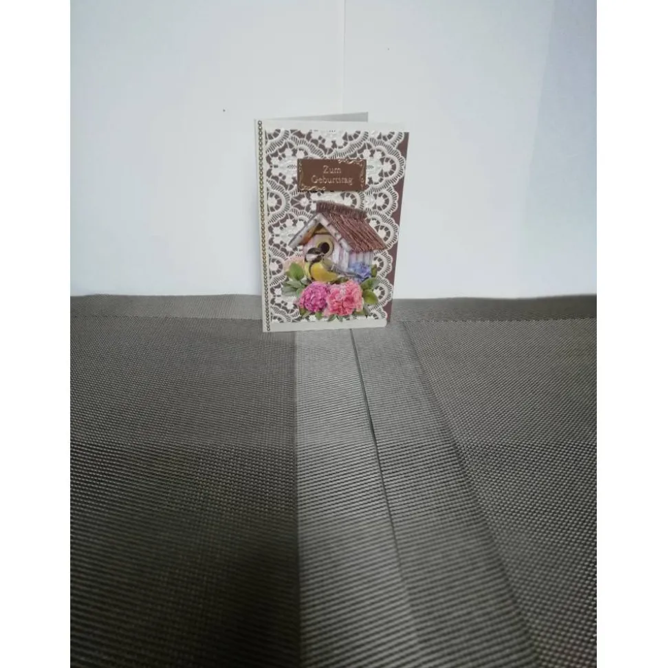 Geburtstagskarte in cremebraun mit einem Singvogel