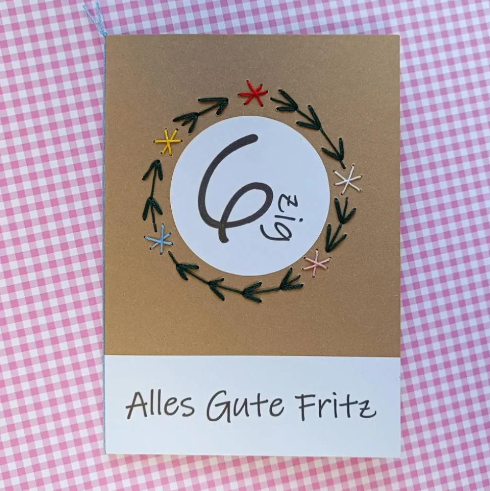 Geburtstagskarte Jubiläum mit Jahreszahl und aufgesticktem Blumenkranz mit Wunschtext