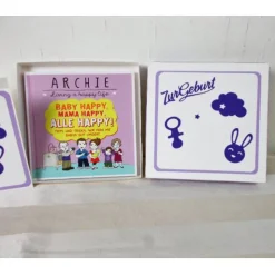 Geldgeschenk Geburt, mit lustigem Buch, weiß lila, Geschenk zur Geburt