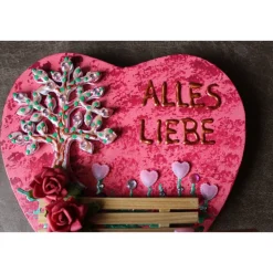 Geldgeschenk zu Geburtstag Muttertag Vatertag BAUM & BANK, Collage, abstrakt gestaltet auf einem herzförmigen Keilrahmen