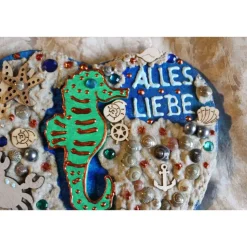 Geldgeschenk zum Muttertag oder Vatertag SEEPFERD, Collage, abstrakt gestaltet auf einem herzförmigen Keilrahmen