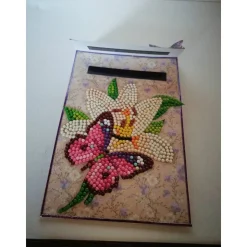 Geldgeschenktäschchen zum Geburtstag für eine Frau mit rosafarbenen Blumen