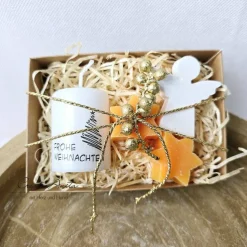 Geschenk zu Weihnachten - Weihnachtskerze mit Seifensterne Orange und kleinem Schutzengel