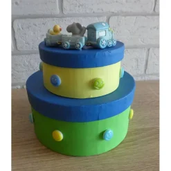 Geschenkverpackung Torte mit Eisenbahn und Schaukelpferd - blau, gelb, grün, türkis