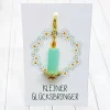 Glücksbringer Frühlingslicht Kerze goldfarben/mint – Handgemachter Anhänger als Geschenk