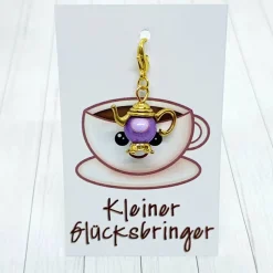 Glücksbringer Kanne goldfarben/lila – niedlicher Anhänger für Heißgetränk-Liebhaber