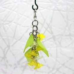 Glücksbringer Taschenbaumler "Zarte Blumen" gelb – Verspielter Anhänger mit Acrylblüten