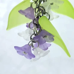 Glücksbringer Taschenbaumler „Zarte Blumen“ lila – Verspielter Anhänger mit Acrylblüten & Wunschkärtchen