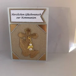 Glückwunsch Karte zur Kommunion in goldfarben mit abnehmbaren Schutzengel weiß/gold Grußkarte