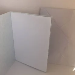 Glückwunsch Karte zur Kommunion in goldfarben mit abnehmbaren Schutzengel weiß/gold Grußkarte