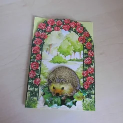 Glückwunschkarte Geburtstag 3-D Igel am Rosenbogen – Humorvolle Grußkarte, Geldkarte, Unikat