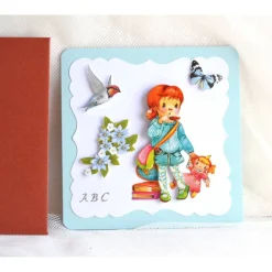 Glückwunschkarte zum Schulanfang Mädchen mit Puppe hellblau-rostrot (5)