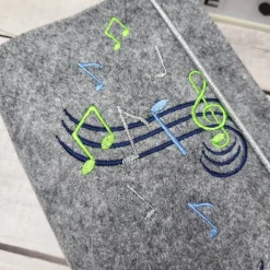 Gotteslobhülle Noten und Musikschlüssel, Kommunion