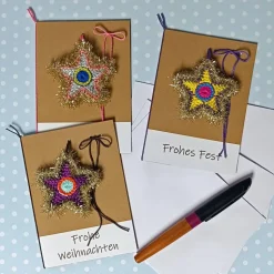 Grußkarte Weihnachten glitzernder Stern gehäkelt mit Wunschtext