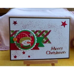 Handgemachte Weihnachtskarte mit Schneemannkopf